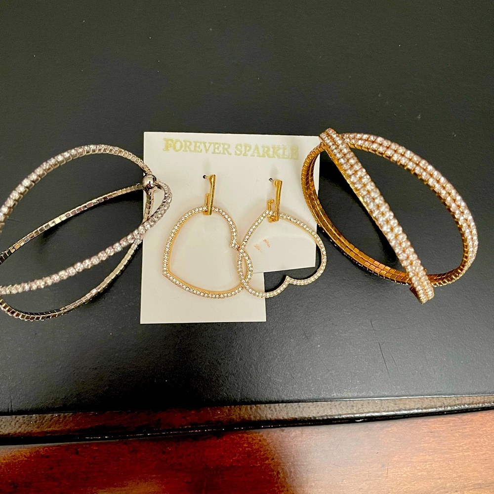 Sparkle costume jewelry; earrings and two bracelets